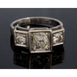 A diamond three stone 18ct white gold and platinum set ring,