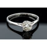 A diamond solitaire platinum ring, the round old cut diamond weighing approximately 1.