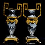 A pair of 19th Century European amphora shaped clear glass vases,