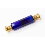 A 19th Century blue glass double ended scent bottle, slice cut cylinder form,