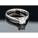 A diamond solitaire ring 18ct white gold, the round brilliant cut diamond weighing approximately 0.