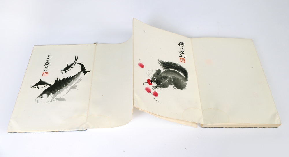 Studio of Qi Baishi (1863-1957): an album of 22 coloured woodblock prints; studies of flowers,