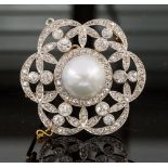 An Art Deco pearl and diamond flower head cluster pendant/brooch,