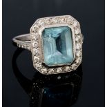 An aquamarine and diamond octagonal 18ct white gold cluster ring,