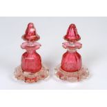 A collection of Bohemian glass including a pair of ruby cased scent bottles,