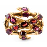 A Victorian garnet set yellow gold brooch,