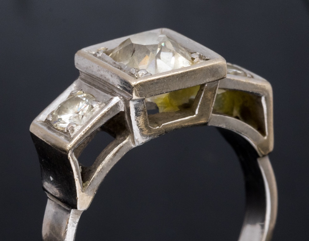 A diamond three stone 18ct white gold and platinum set ring, - Image 2 of 2