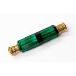 A 19th Century green glass double ended scent bottle, cylinder form, slice cut,