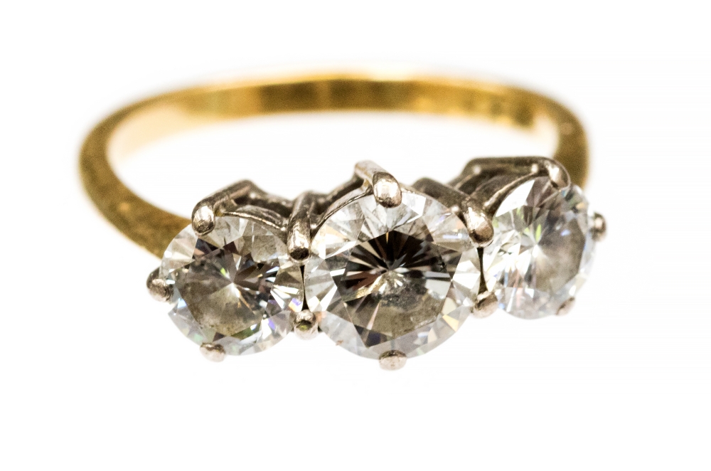 A diamond three stone ring,