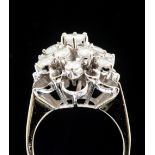 A diamond flower head 14ct gold cluster ring,