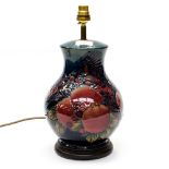 A modern Moorcroft Pomegranate lamp base, baluster form with birds amongst fruit,