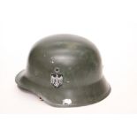 Reproduction modern copy of WW2 German M42 pattern steel helmet. With liner and chinstrap.