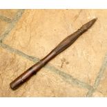 A tribal or folk carved poker/stake, various cross hatching and fluted decoration,