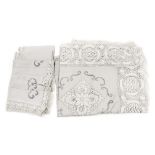 A pale grey hand crocheted tablecloth and matching napkins x 7,