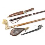 A leather embossed powder pouch with a sword stick in the form of a leather swagger stick,