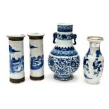 A pair of Chinese blue and white craquelure spill vases and a shouldered vase;