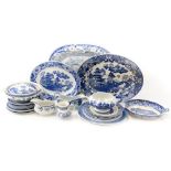 A large collection of Staffordshire blue and white dinner ware, Willow pattern etc.