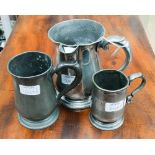 Three pewter measures - a pewter half pint measure with touch mark in base and hallmarks for James