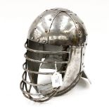 A bespoke metal armour helmet, Cromwellian influence with face guard to front,