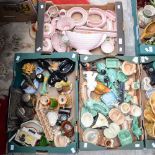 A large collection of Sylvac ornaments including box of pink trinkets, Dog vases, baskets, trinkets,