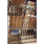 A pair of handforged wrought iron gates stamped J.