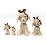 A set of four Sylvac graduating Dogs with bandages around heads, No. 2451, No. 2455, No. 3183, No.