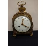 A brass French mantle clock,