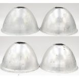 A set of four stylish 1950s aluminium lamp shades, 55cm in diameter,