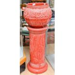 A Burmantofts Jardiniere and stand 'Faience' No 1570 with deep pink self coloured peri winkle