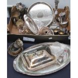 A collection of silver plate including Corinthian candlestick jugs,