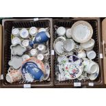 A collection of ceramic cups, saucers,