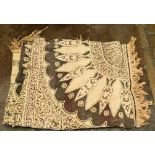 A large Persian style textile throw or shawl,