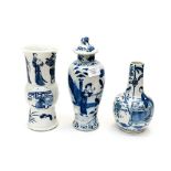 Three Chinese blue and white vases, Kangxi style, including gu vase,