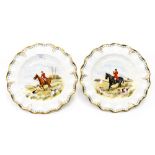 A pair of Royal Crown Derby cabinet plates, each hand painted with Hunting scenes,