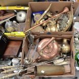 Two boxes of brass and copperware to include copper kettle, horn, fire dogs and companion set,