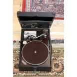 A 1940/50s picnic carry record player in black vinyl case