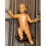 An 18th Century carved wood painted figure of infant Christ, probably Spanish,