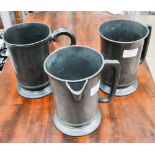 A pewter quart footed bucket with mark for F.H.