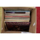 A box of vinyl records including Jim Reeves,