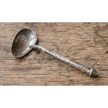 An Indian silver feeder spoon