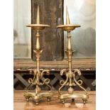 A pair of gilt brass Renaissance style pricket sticks,