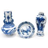 A group of Chinese blue and white porcelain including baluster vase, planter with figures,