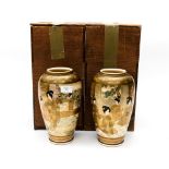 Two boxed Satsuma vases, both having gold decoration,