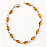 A silver and amber bracelet