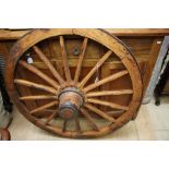 A 19th Century wooden cartwheel, with iron rim,