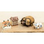 Four various ceramic money boxes,