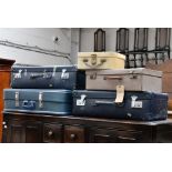 Five vintge suitcases,