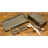 An Arts and Crafts pewter embossed tray,