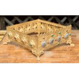 A Gothic Revival gilt metal ecclesiastical mount or stand, square section, reticulated and jewelled,