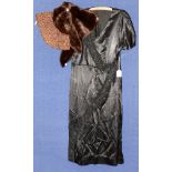 A late 1930s/early 40s evening dress - mid length in black satin,